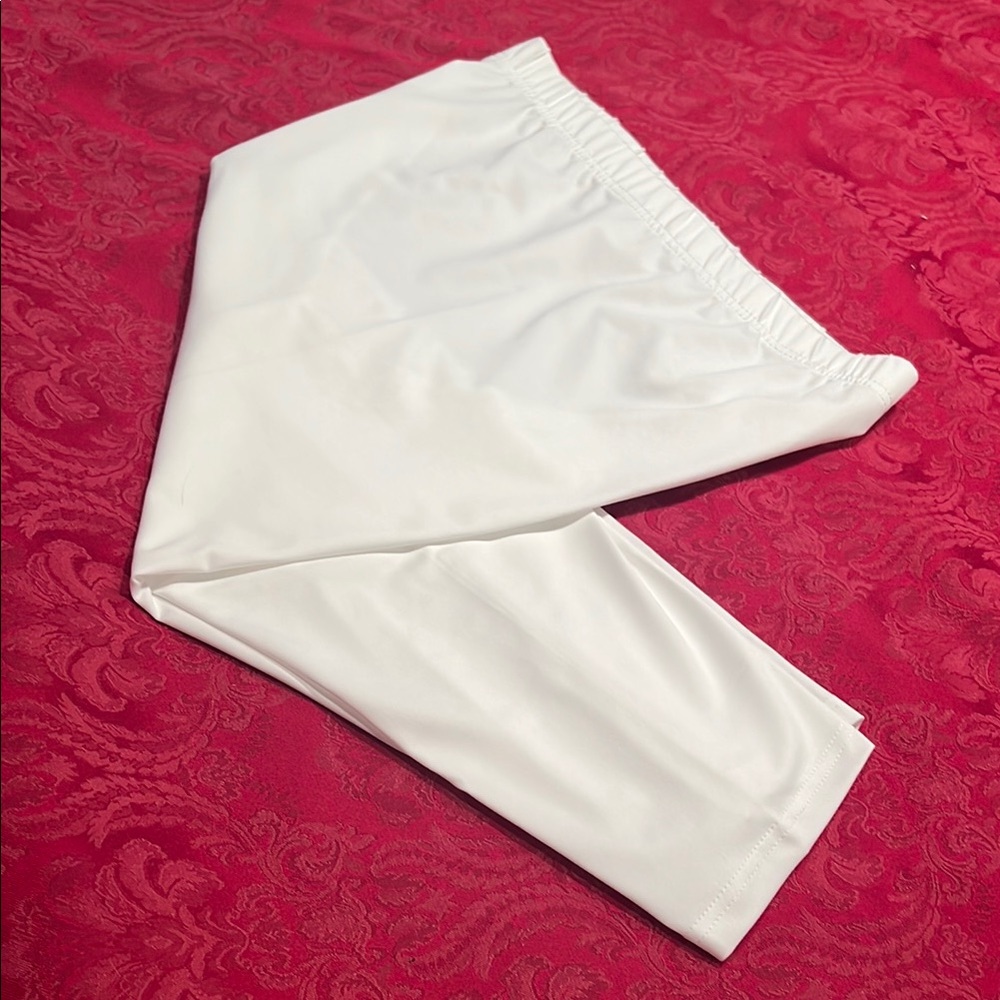 New in bag women’s white Capri pants.